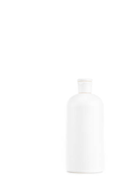 istock White cosmetic bottle with cap isolated on white 1150456699