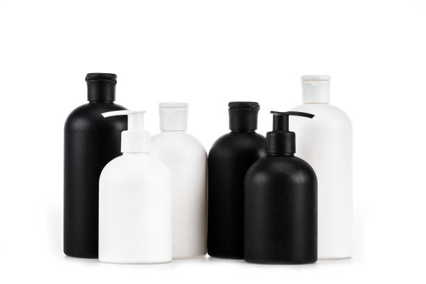 istock Black and white cosmetic bottles isolated on white 1150456701
