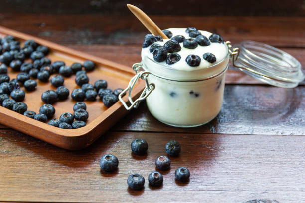 istock fresh Blueberries with yogurt in glass 1150456927