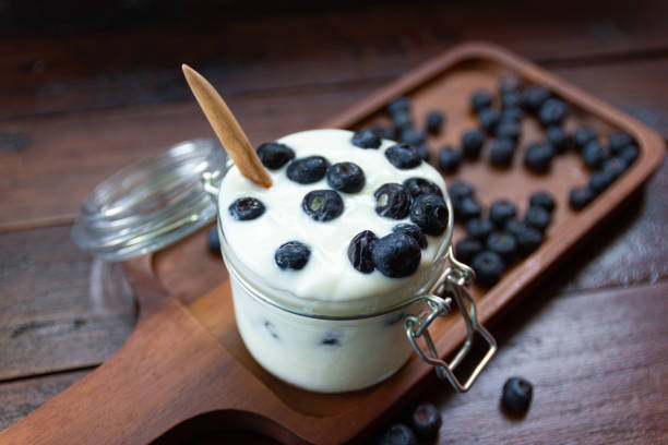 istock fresh Blueberries with yogurt in glass 1150457065
