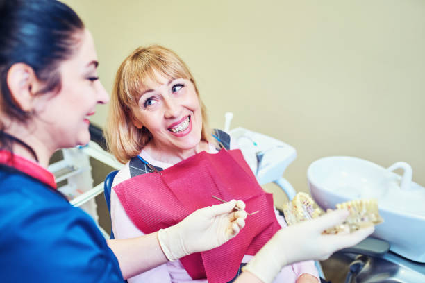 istock Dentist examining a patient's teeth in the dentist. 1150458540