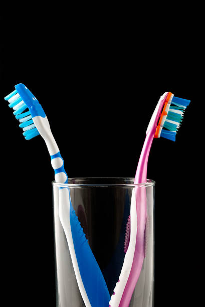 escovas de dente - toothbrush pink turquoise blue - fotografias e filmes do acervo