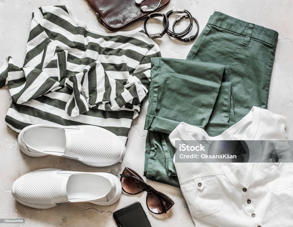 Spring Summer Set Of Womens Casual Wear Cotton Pants White Tshirt Striped  Pullover Leather Sneakers Bag Smartphone And Accessories On A Light  Background Top View Fashion Concept Stock Photo - Download Image