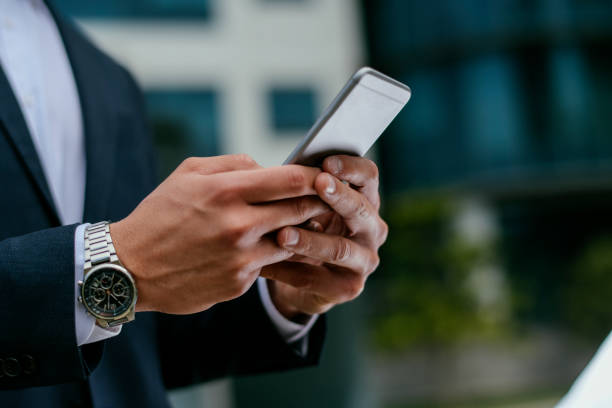 istock Handsome young businessman talking on his phone 1150466881