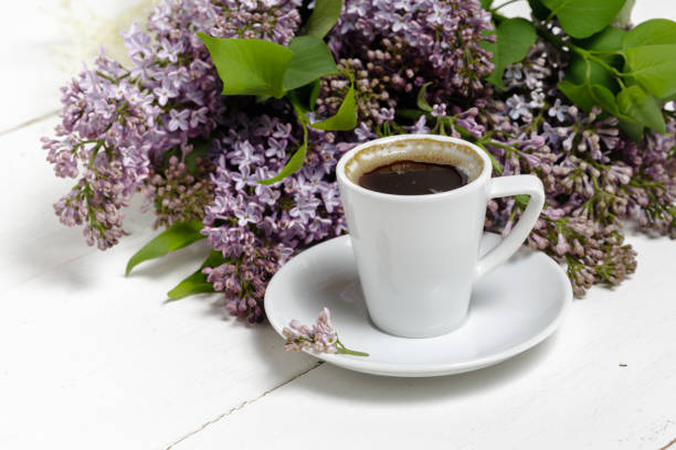 istock Coffee for Breakfast and lilac flowers. Selective focus 1150466984