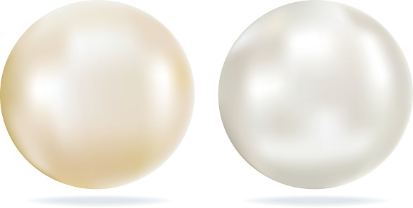 Ivory & white single pearls. Two jewellery pearl stones. One white pearl. One Ivory pearl. Both pearls have highlights making them look realistic. Ivory & White Pearls with shiny Highlights.