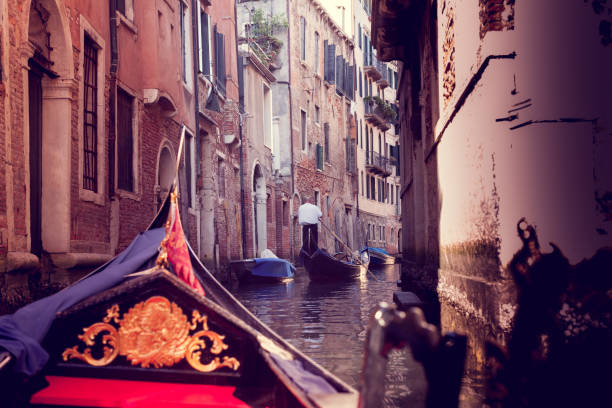 istock narrow canal in Venice 1150467977
