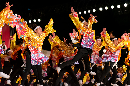 YOSAKOI Soran Festival. Powerful dance performances parade in Odori Park, Sapporo City. Many teams showcase the original dance. A very popular festival for tourists.