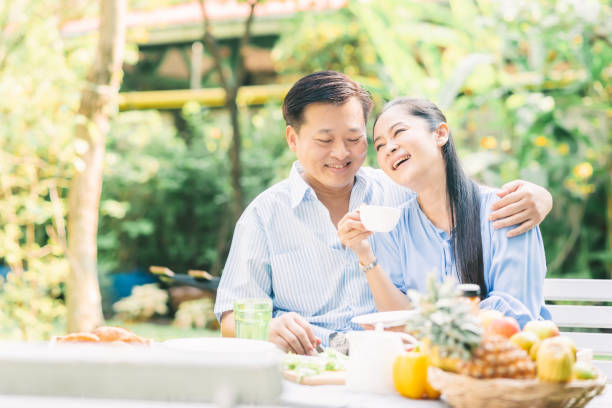 istock Happy Asian senior couple laughing 1150469603