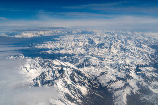 istock Snow on alps aerial view panorama 1150470253