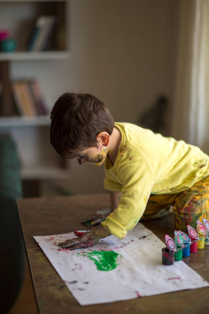 istock Child Hand Painting 1150471319