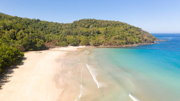 istock Tropical white beach and warm lagoon 1150472025