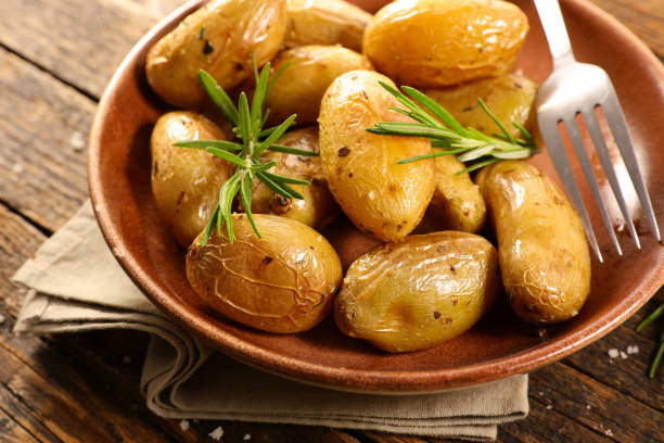 istock roasted potatoes with rosemary in plate 1150475244