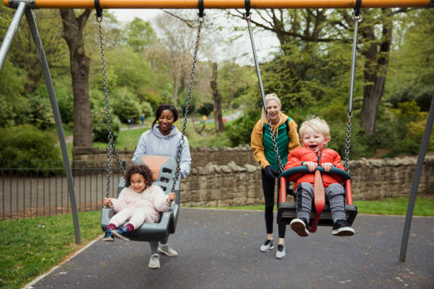 istock Mothers and Children Playing in the Park 1150475340