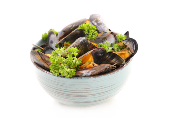 mussel and parsley isolated on white background