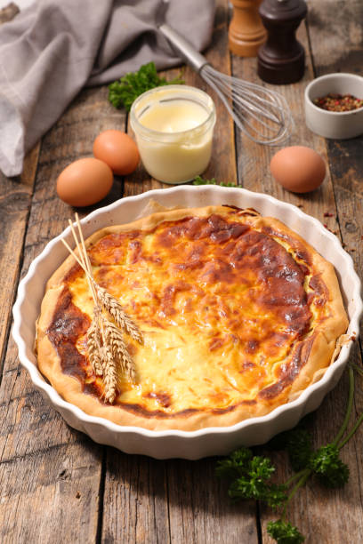 istock homemade quiche and ingredient on wood background 1150476018