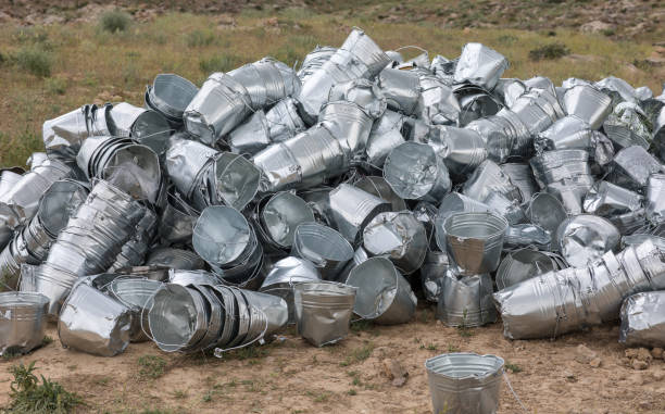 pile of empty metal buckets outdoors pile of empty metal buckets outdoors zinced steel stock pictures, royalty-free photos & images