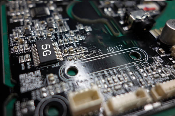 istock Black integrated circuit board filled with electronic components 1150477887