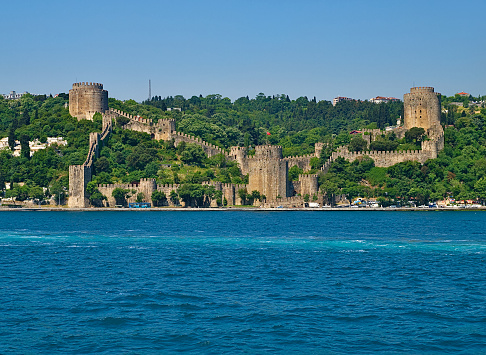 Rumelihisari (Rumeli Fortress) as seen from a ship cruise in Bosphorous. Istanbul, Turkey.