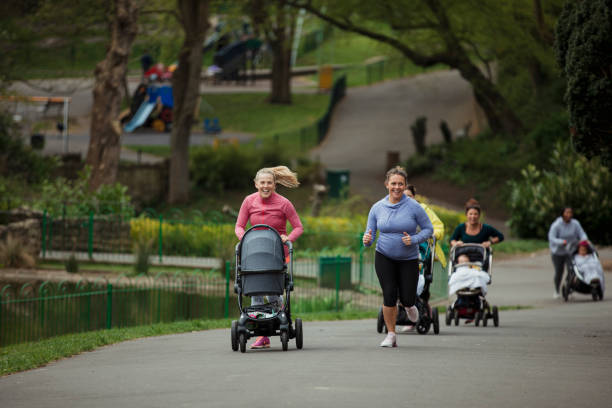 istock Mothers Racing With Their Babies 1150480305