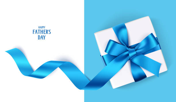 ozdobne pudełko z niebieską kokardką i długą wstążką. happy father's day tekst. widok z góry - blue bow ribbon gift stock illustrations