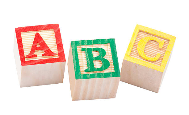 istock Wooden alphabet blocks with clipping path 115048268