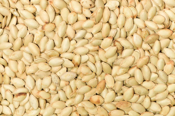 istock The background of pumpkin seeds 1150485951