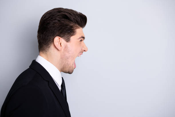 istock Evil collar. Profile side view photo frustrated irritated stylish manager annoyed have disagreement feel rage crazy disappointed scream shout yell dressed modern clothing isolated argent background 1150488178