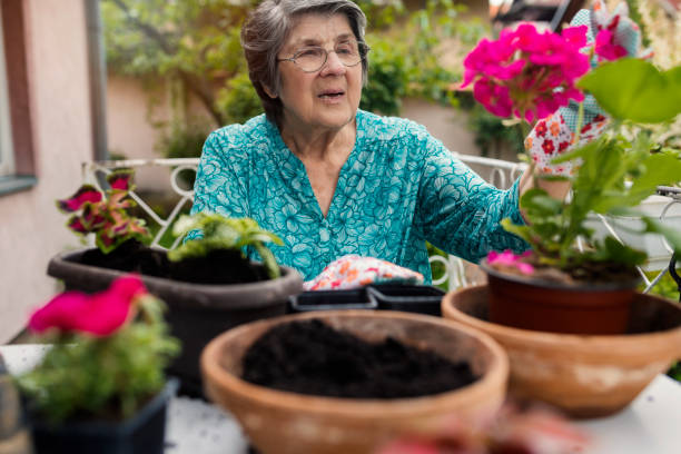 istock Senior Woman Gardening 1150489303