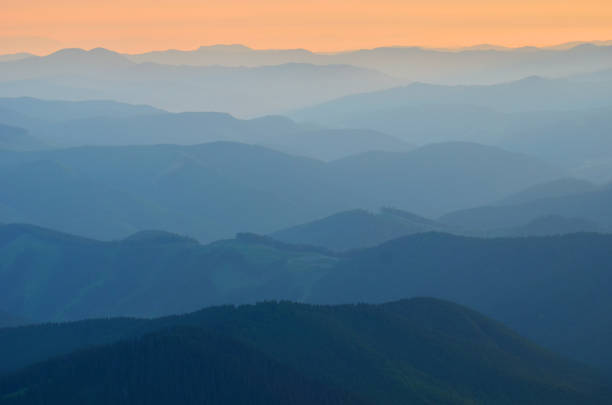 istock Mountain ranges at sunrise time 1150489533