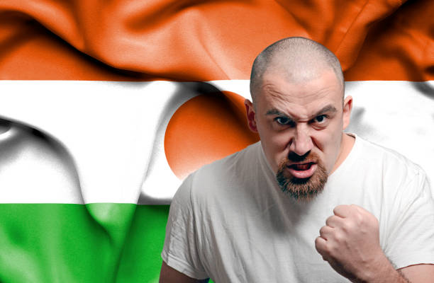 istock Angry man against flag of Niger 1150490934