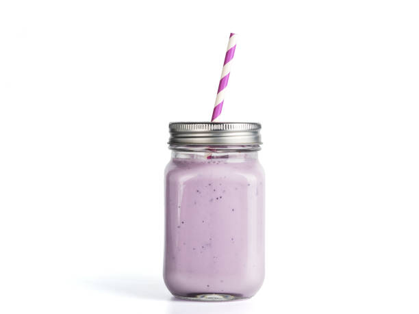 istock blueberry smoothie in mason jar glass isolated 1150491043