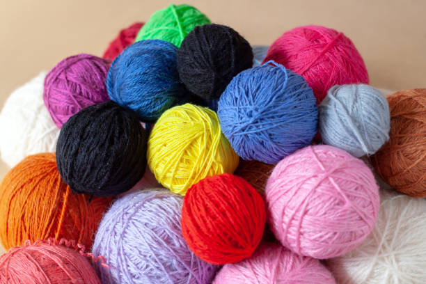 istock A bunch of colorful yarn balls. 1150495424