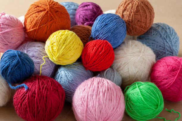 istock A bunch of colorful yarn balls. 1150495436