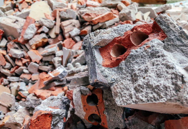 istock Pile of Broken red brick and concrete at construction site 1150495585