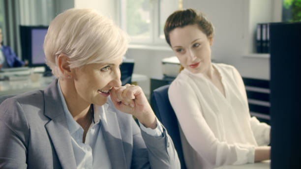 istock Woman satisfied with her work. Smiling 1150496115