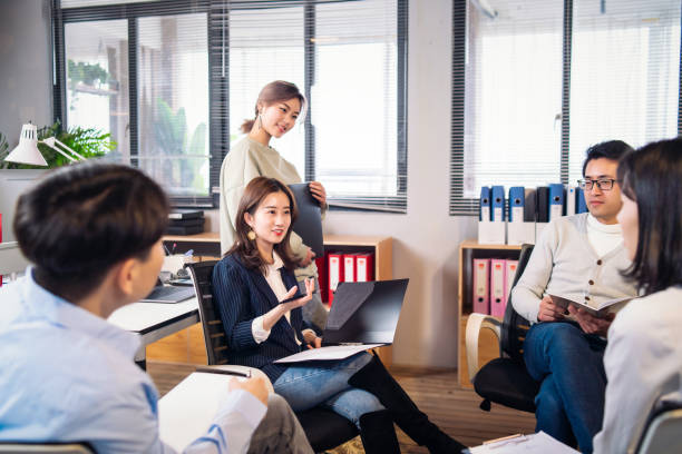 istock Colleagues having a discussion in a start up business office 1150499063