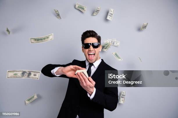 Portrait Of His He Nice Attractive Cheerful Guy Professional Executive Leader Expert Development Agent Broker Financier Banker Throwing Away Exchange Lottery Credit Isolated Over Light Gray Background Stock Photo - Download Image Now