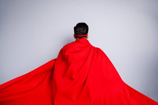 Close up back rear behind view photo hiding facial expression he him his man ready flight use superpower wear red long cloak raised wind safety protection human race concept isolated grey background.