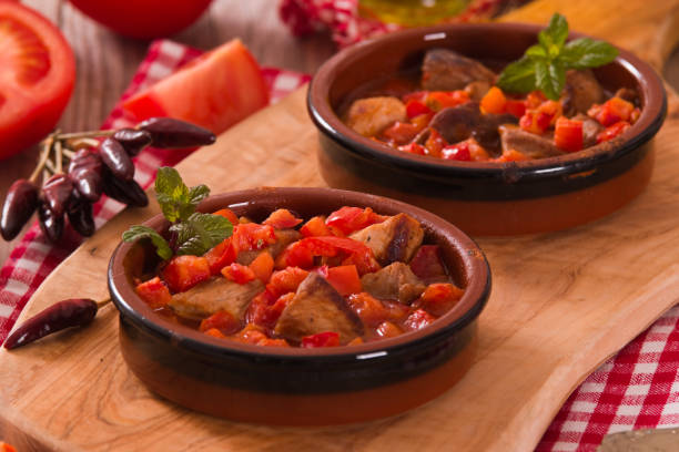 istock Marinated pork loin in tomato sauce. 1150506765