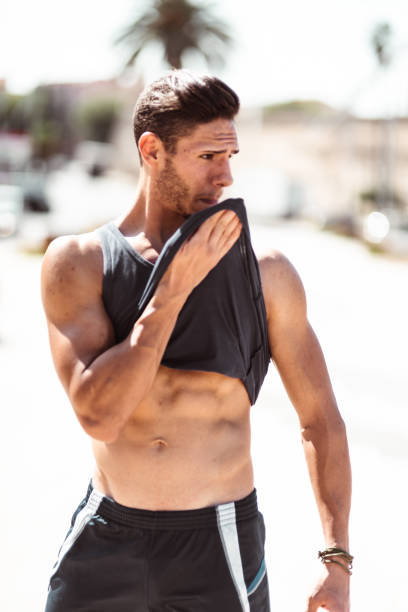 istock muscle man tired after jogging 1150507714