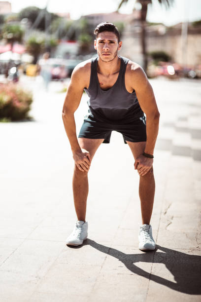istock muscle man tired after jogging 1150507785