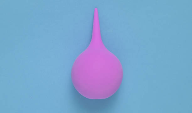 istock Enema on blue background, medical concept, top view, minimalism 1150508327
