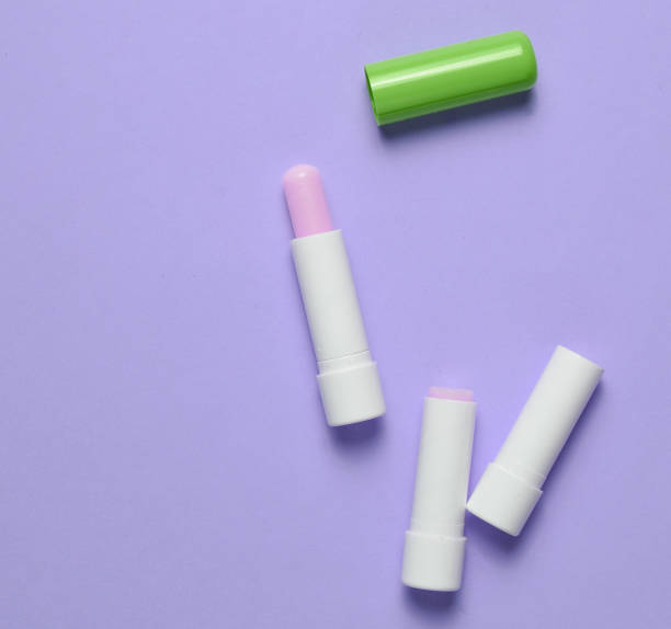 istock Hygienic lipstick on  pastel background, top view, minimalism 1150508408