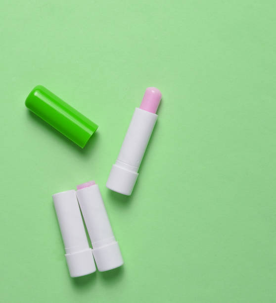 istock Hygienic lipstick on  pastel background, top view, minimalism 1150509058