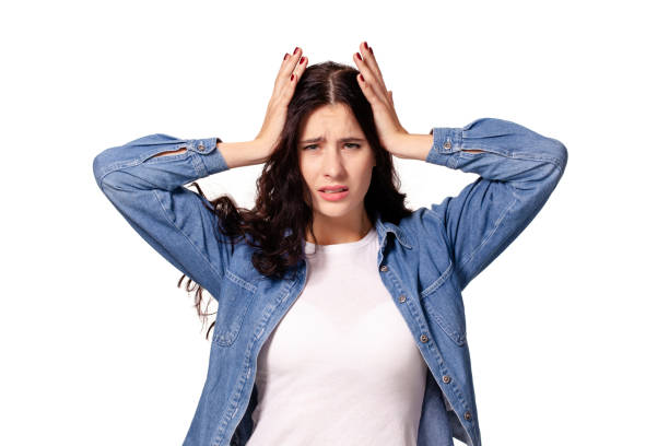 istock Thoughtful attractive young woman thinking on white background 1150509314