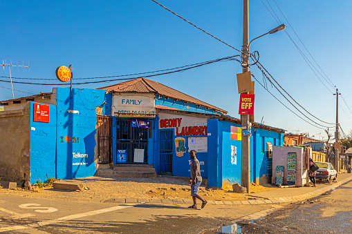 Family mini market on the street corner in Alexandra Township, Johannesburg. Also known as Alex developed since 1912 and allocated for blacks in the apartheid era, the self governing Alexandra action committee took charge of running Alexandra and now forms part of Johannesburg.