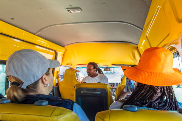 Inside the taxi on the Alexandra Township tour Inside the taxi on the Alexandra Township tour. Also known as Alex developed since 1912 and allocated for blacks in the apartheid era, the self governing Alexandra action committee took charge of running Alexandra and now forms part of Johannesburg. alexandra township photos stock pictures, royalty-free photos & images