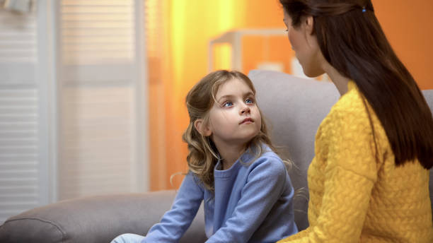 istock Mother and daughter talking, mom explaining how to behave in life situations 1150510626