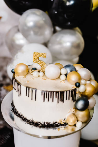 istock Birthday Cake on a background balloons party decor. Copy space. Celebration 5 years, concept. Trendy Cake. Candy bar. Delicious reception. 1150510718